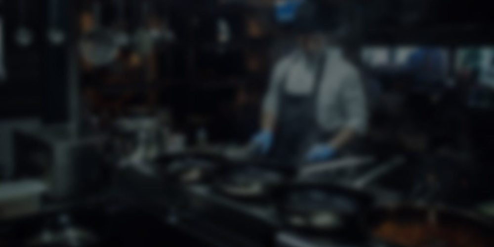 Shot of a chef cooking in a professional kitchen