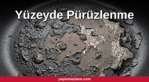 Kabarmış ve pürüzlü hale gelmiş bozuk tava kaplaması