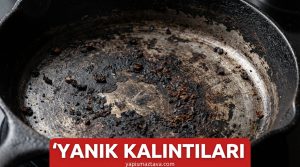 Yanmış tava yüzeyinde karbon birikimi ve yanık kalıntıları